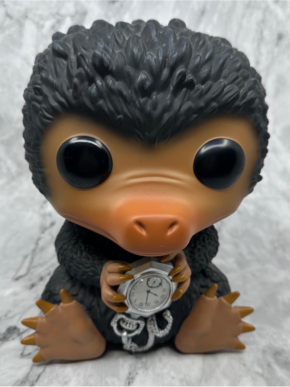 Funko Black and Brown Niffler Figure with Pocket Watch
